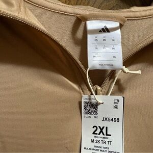 Adidas light weight jacket. New with tags.